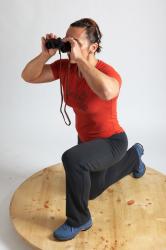 ANGELINA KNEELING POSE WITH SPYGLASS